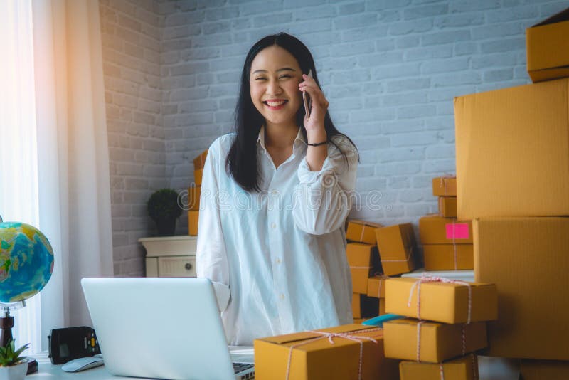 Young Women happy after new order from customer, business owner royalty free stock images Young Women happy after new order from customer, business owner royalty free stock images