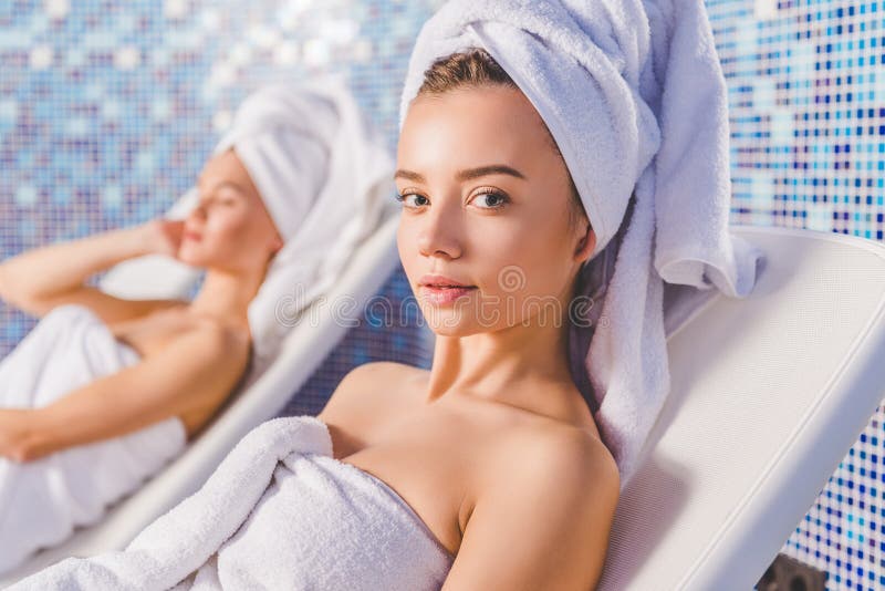 Young Women Relaxing on Sunbeds Stock Image Image of temperature