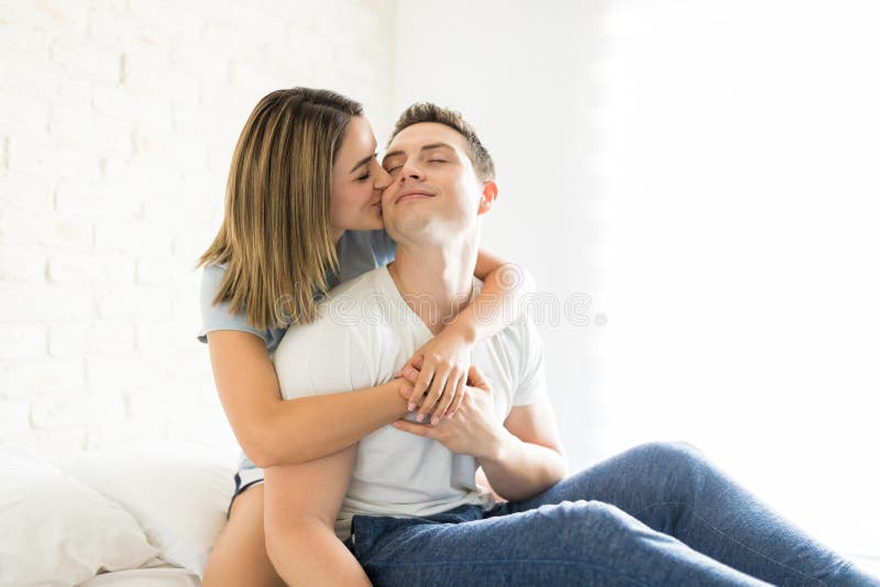 Woman Showing Love And Affection By Kissing Man I
