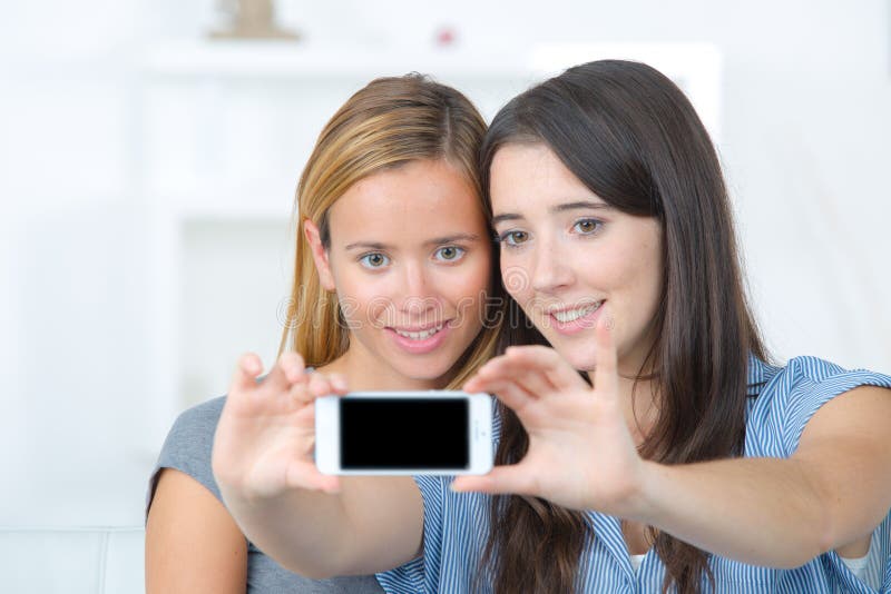 Young women taking selfie stock photography