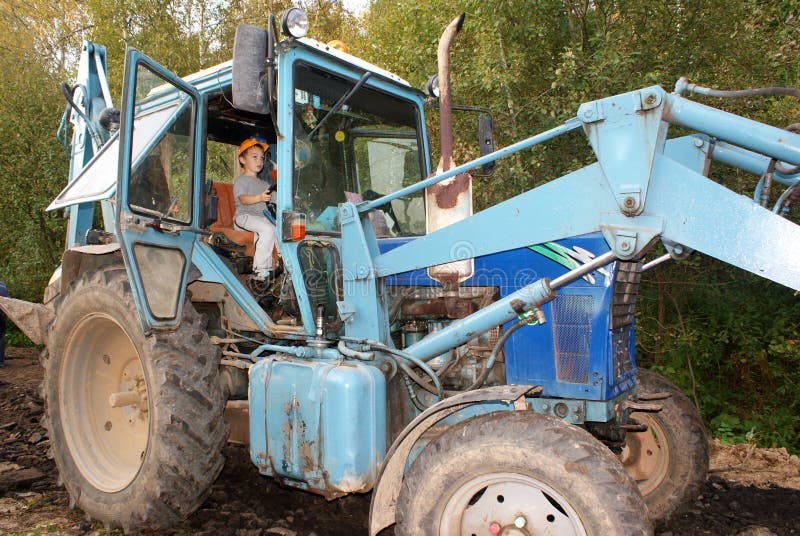 Young tractor driver stock image. Image of work, rural 12740431