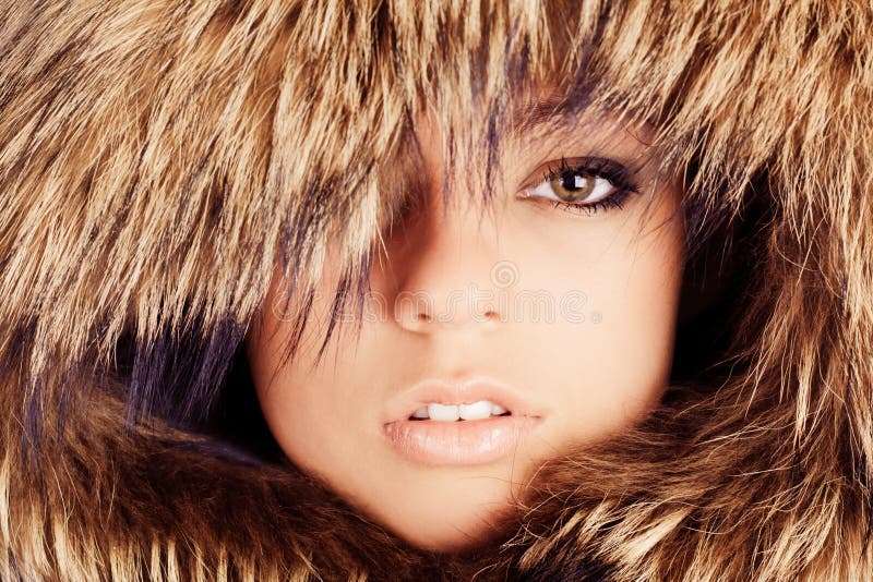 Young girl in fur hood