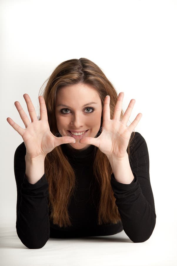 Young girl showing ten fingers