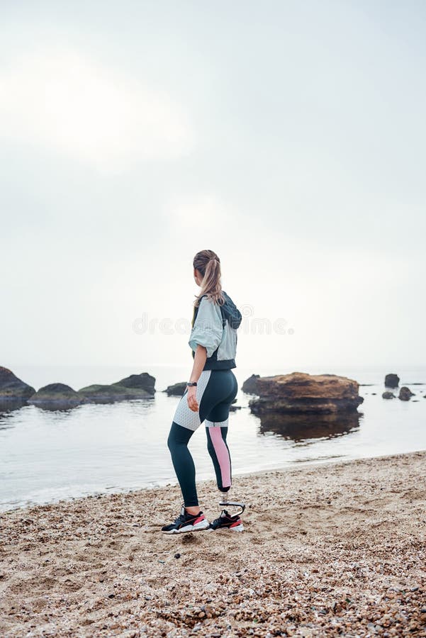 Woman with Prosthetic Leg on Bench · Free Stock Photo