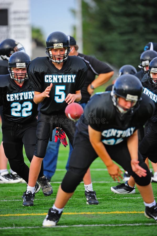 Youth American Football Quarterback Receives Ball Editorial Stock Photo
