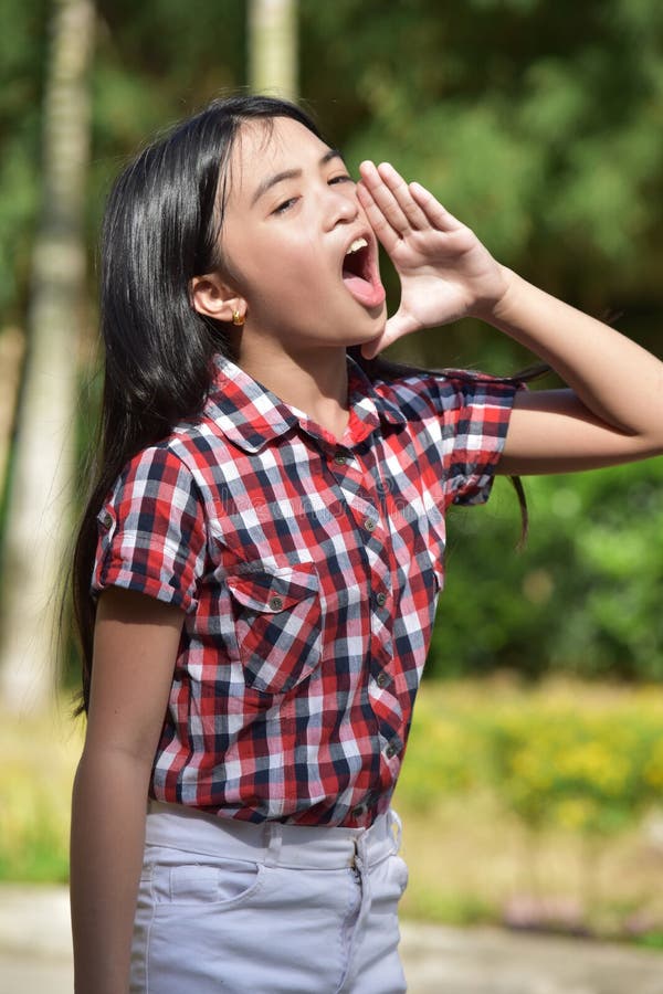 A Youthful Filipina Shouting zdjęcie stock