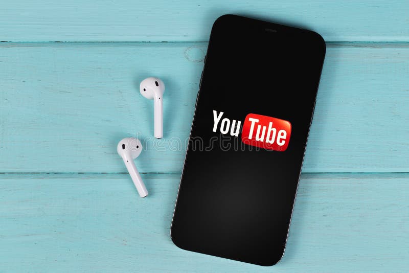 YouTube Mobile Logo App on the Screen Smartphone IPhone with AirPods on a  Colored Background Editorial Stock Image - Image of popular, media:  246017299