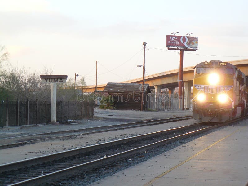 Train entering Yuma. Yuma is a city in southwest Arizona. Overlooking the Colorado River, Yuma Territorial Prison State Historic Park is home to the preserved cells and guard tower of a Wild Westâ€“era prison. Nearby, Quartermaster Depot State Historic Park was a 19th-century military warehouse and telegraph station. A 1907 steam locomotive on Pivot Point Plaza commemorates the Southern Pacific Railroad, which once ran through the cit. Train entering Yuma. Yuma is a city in southwest Arizona. Overlooking the Colorado River, Yuma Territorial Prison State Historic Park is home to the preserved cells and guard tower of a Wild Westâ€“era prison. Nearby, Quartermaster Depot State Historic Park was a 19th-century military warehouse and telegraph station. A 1907 steam locomotive on Pivot Point Plaza commemorates the Southern Pacific Railroad, which once ran through the cit