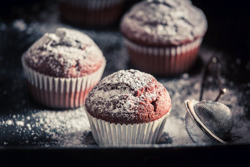 Yummy and sweet chocolate muffin with caster sugar