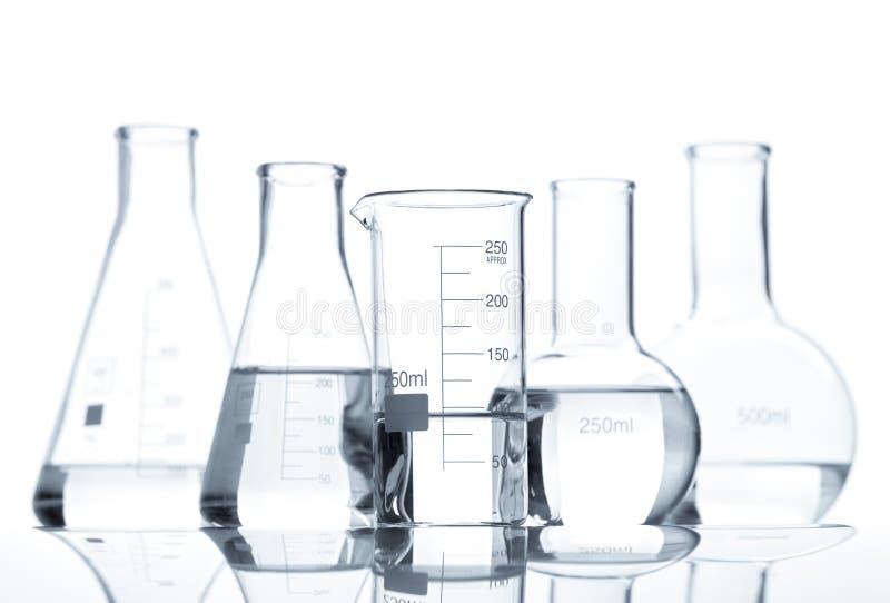 Five classic laboratory flasks with a clear liquid, isolated. Five classic laboratory flasks with a clear liquid, isolated