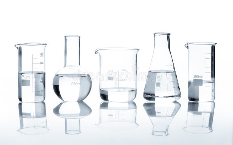 Five laboratory flasks with a clear liquid, isolated. Five laboratory flasks with a clear liquid, isolated