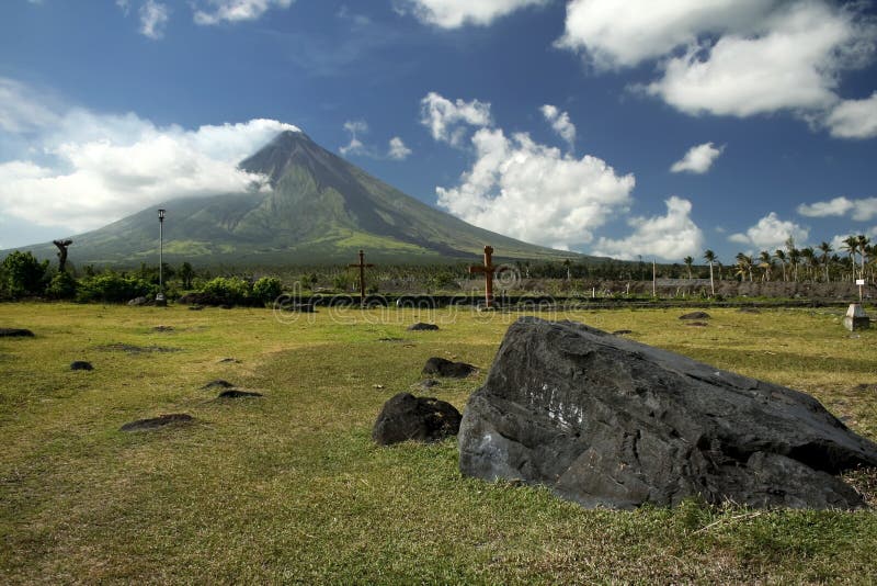 Huge boulder from previous eruptions in the debris field of active volcano mount mayon in albay province luzon island in the philippines. Huge boulder from previous eruptions in the debris field of active volcano mount mayon in albay province luzon island in the philippines