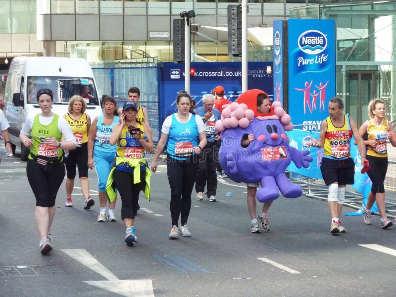 London - April 22: Fun Runners Attending The Annual London Marathon London April 22nd, 2012 in London, England. London - April 22: Fun Runners Attending The Annual London Marathon London April 22nd, 2012 in London, England.