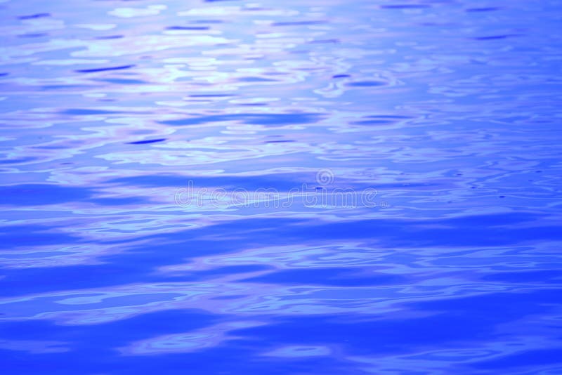 Soft blue waves in calm waters. Soft blue waves in calm waters
