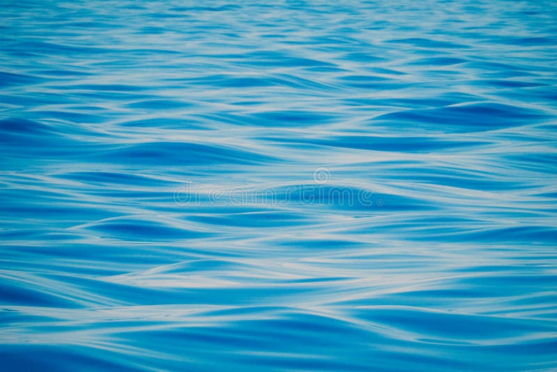 Soft blue and pink waves. Light movement of water. Soft blue and pink waves. Light movement of water