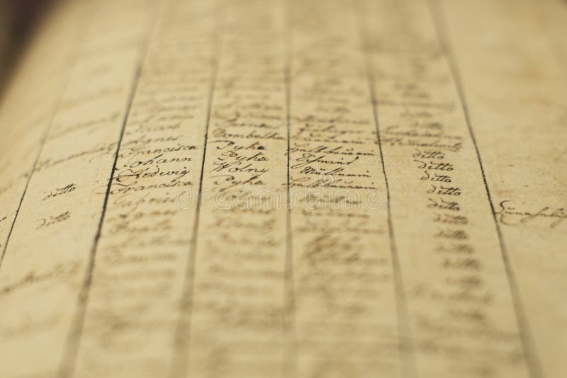 A soft focus of an old book of local records with list of residents\' names and information. A soft focus of an old book of local records with list of residents\' names and information