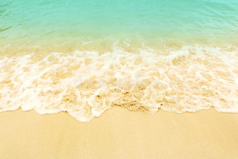 Soft wave on the beach. Summer season on empty tropical beach with waves and clear sand. Soft wave on the beach. Summer season on empty tropical beach with waves and clear sand.