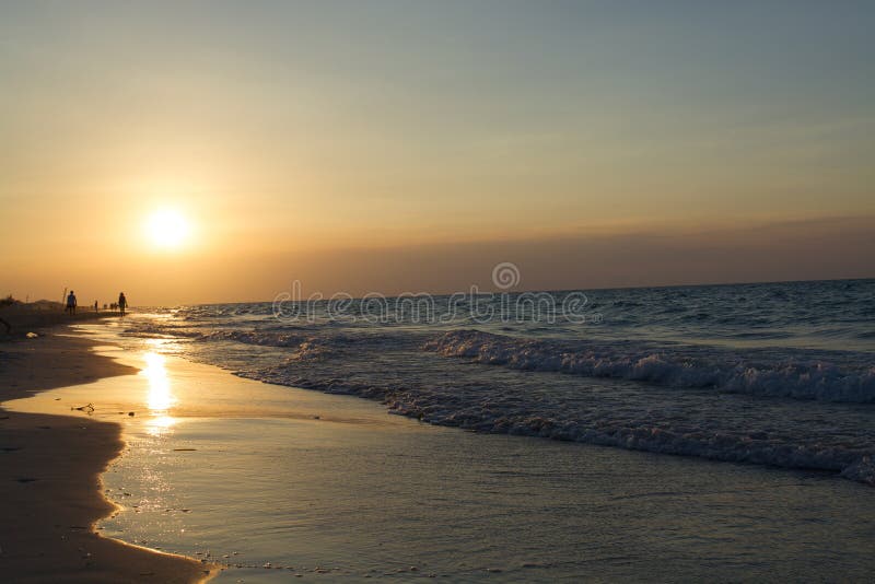 The only place where your bare feet understand the surging flow of nature. Image like this calms the mind and spirit with sunrise waving at the beauty of calm water. The only place where your bare feet understand the surging flow of nature. Image like this calms the mind and spirit with sunrise waving at the beauty of calm water.