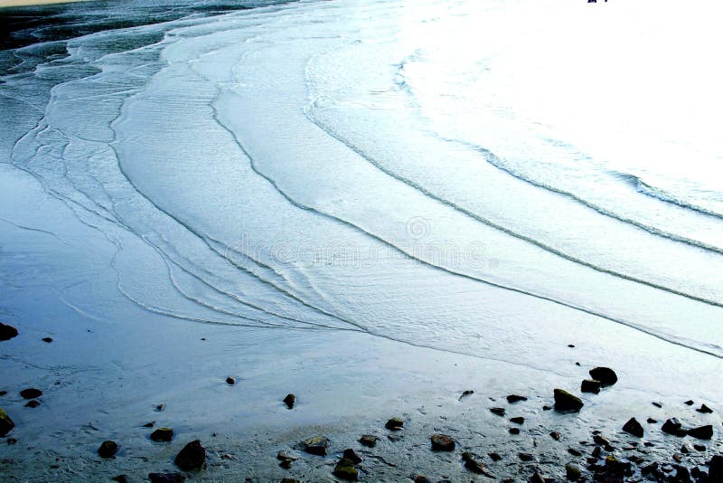 Soft blue waves at the beach. Soft blue waves at the beach