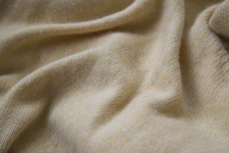 Zachte kasjmiertextuur, comfortabele warme kasjmiersweater of algemene textuur