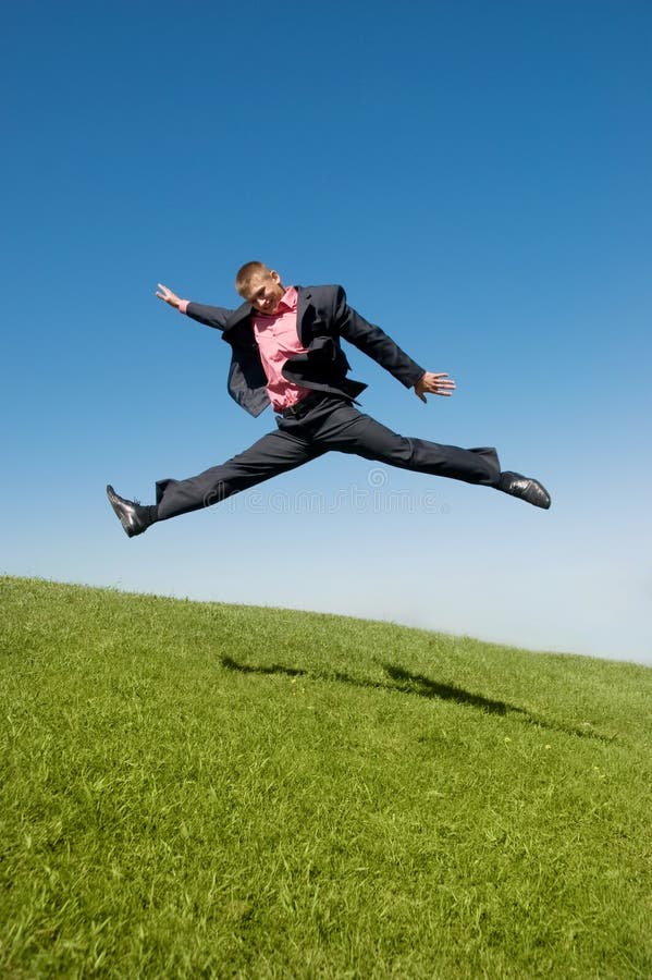 Businessman rushing to work against blue sky. Businessman rushing to work against blue sky