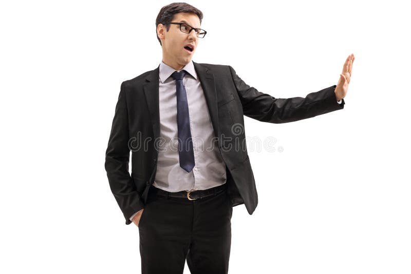 Zakenman die een afvalgebaar maken stock foto Zakenman die een afvalgebaar maken stock foto