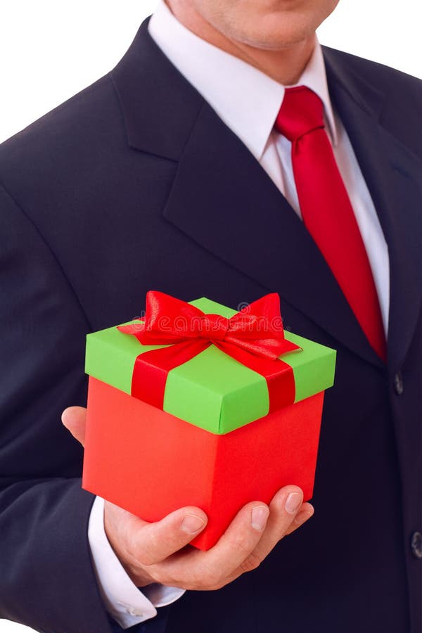 Zakenman die rode giftdoos houden stock foto Zakenman die rode giftdoos houden stock foto