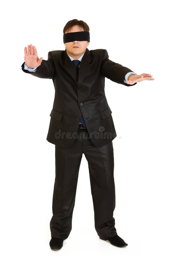 Disoriented businessman with blindfold covering his eyes isolated on white. Disoriented businessman with blindfold covering his eyes isolated on white