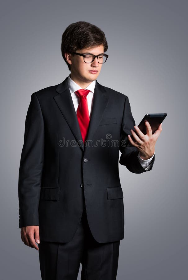 Zakenman met het Stootkussen van de Aanraking stock foto Zakenman met het Stootkussen van de Aanraking stock foto