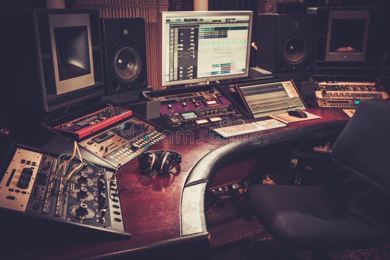 Close-up of boutique recording studio control desk. Close-up of boutique recording studio control desk.