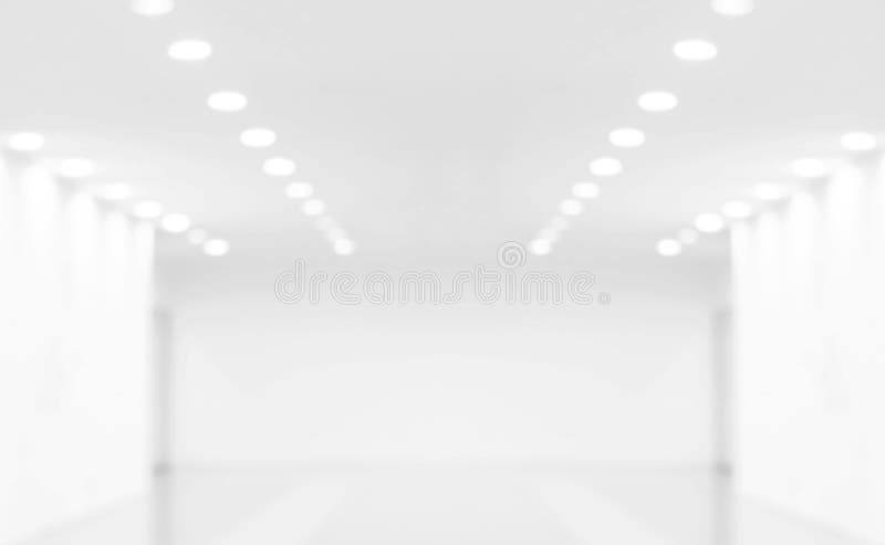 Zamazanej tło izbowej sala nowożytny biały puste miejsce, Pusty sala plamy pokój zdjęcia royalty free Zamazanej tło izbowej sala nowożytny biały puste miejsce, Pusty sala plamy pokój zdjęcia royalty free