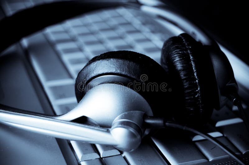 Close up of laptop keyboard and headphones. Close up of laptop keyboard and headphones