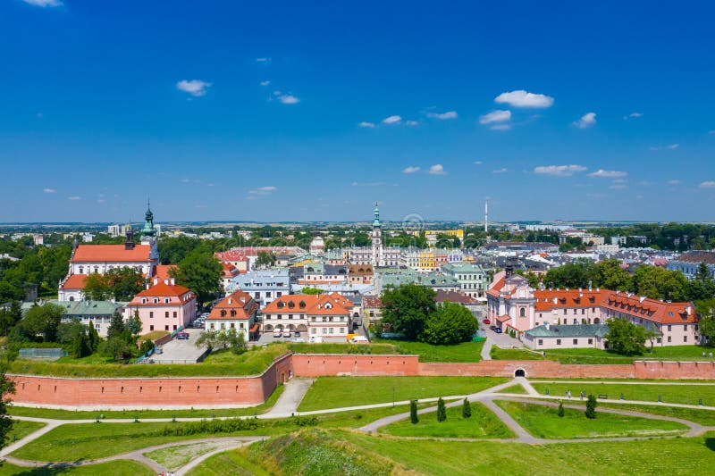 Zamosc, Poland. Aerial view of old town and city main square with town hall. Bird`s eye view of the old city. UNESCO World