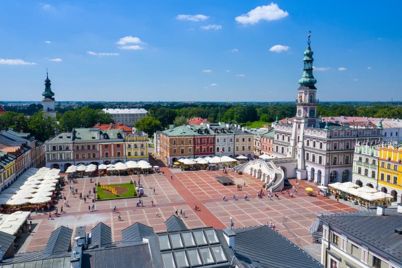 Zamosc, Poland. Aerial view of old town and city main square with town hall. Bird`s eye view of the old city. UNESCO World