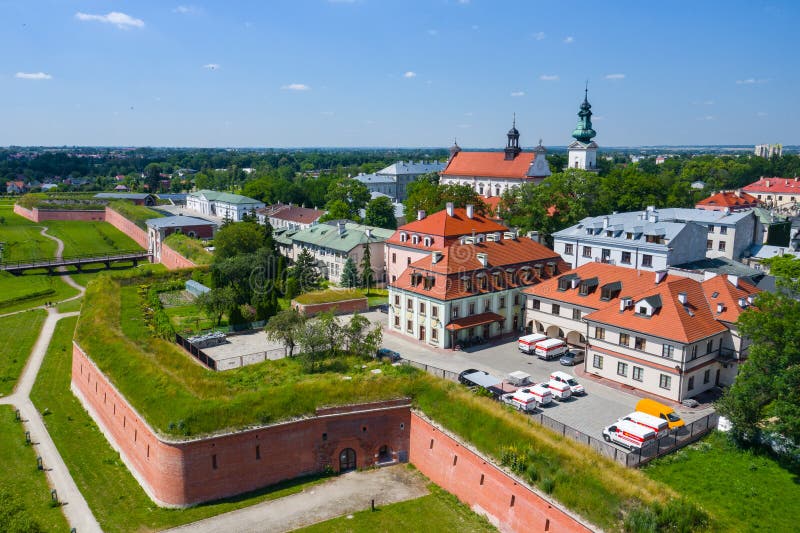 Zamosc, Poland. Aerial view of old town and city main square with town hall. Bird`s eye view of the old city. UNESCO World