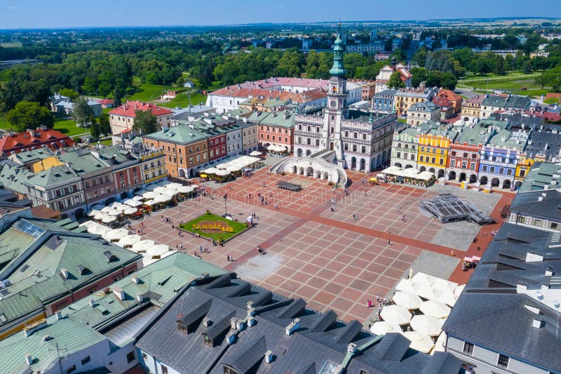 Zamosc, Poland. Aerial view of old town and city main square with town hall. Bird`s eye view of the old city. UNESCO World