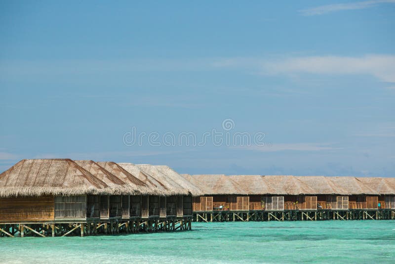 Zamyka w górę obrazka Maldives bungalow i nawadnia willa kurort obrazy stock Zamyka w górę obrazka Maldives bungalow i nawadnia willa kurort obrazy stock
