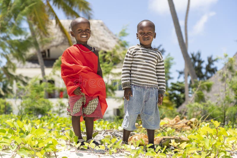 Zanzibar, Tanzania - november 11, 2019 : Two african masai children on the tropical beach in Zanzibar island, Tanzania, east Africa