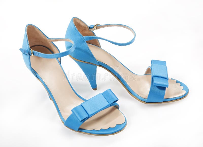 Zapatos Azules Hermosos De La Mujer Aislados En El Blanco Foto de