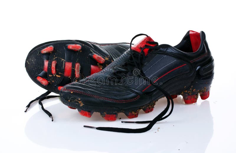 Zapatos del fútbol fotografía de archivo libre de regalías Zapatos del fútbol fotografía de archivo libre de regalías