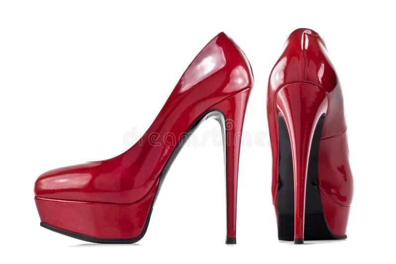 Zapatos femeninos rojos con los tacones altos