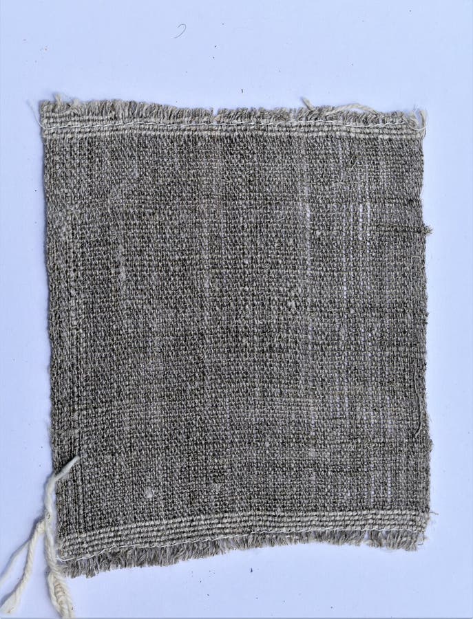 Zbliżenie handwoven wirujący bieliźniany płótno tkaniny obrazy stock Zbliżenie handwoven wirujący bieliźniany płótno tkaniny obrazy stock