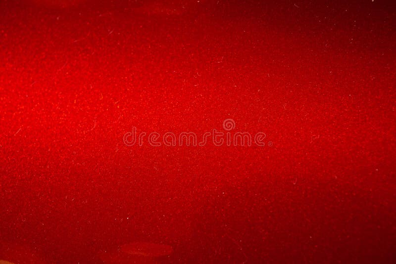 Zbliżenie tła tapety malarskiej na powierzchni samochodu z czerwonym metalem