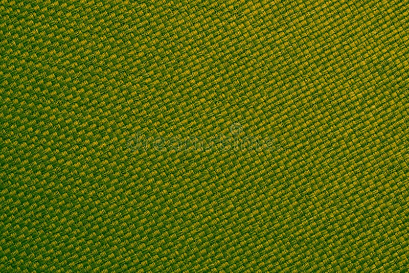 Yellow and green textile close-up. Woven fiber background, plaited cloth surface, natural burlap wallpaper. Macro linen material texture. Yellow and green textile close-up. Woven fiber background, plaited cloth surface, natural burlap wallpaper. Macro linen material texture.