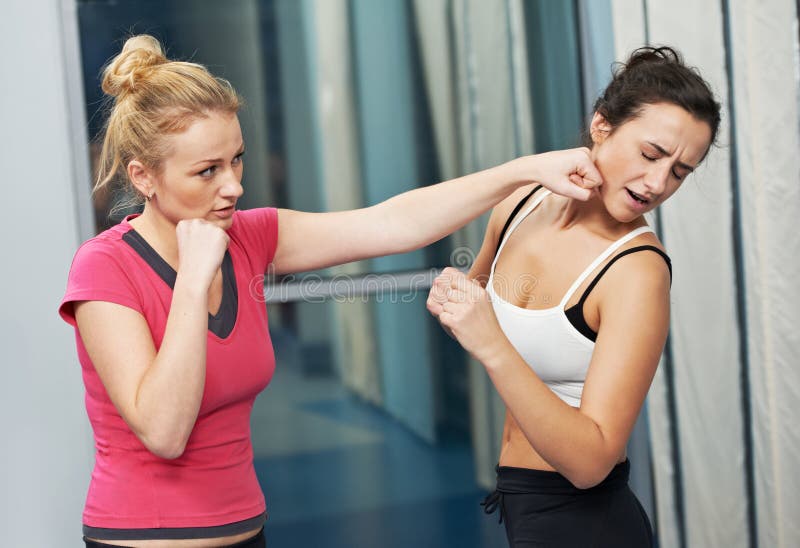 Group of women in gym at fitness physical martial art fighting training exercise in sport wear. Group of women in gym at fitness physical martial art fighting training exercise in sport wear