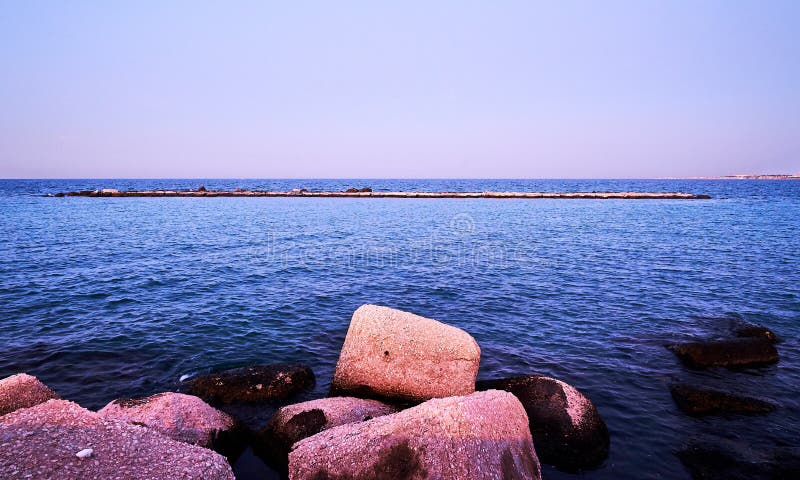 Panoramic view of seafront and coast in Bari, Italy. Romantic, calm, relaxing evening in city. Panoramic view of seafront and coast in Bari, Italy. Romantic, calm, relaxing evening in city.