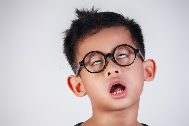 Zeer Bored en Ongelukkig Little Boy royalty-vrije stock afbeelding Zeer Bored en Ongelukkig Little Boy royalty-vrije stock afbeelding