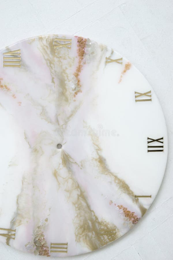 Handmade interior clocks made of epoxy resin. An interior item. Handmade interior clocks made of epoxy resin. An interior item