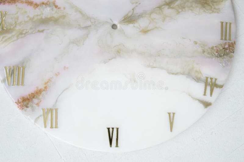 Handmade interior clocks made of epoxy resin. An interior item. Handmade interior clocks made of epoxy resin. An interior item