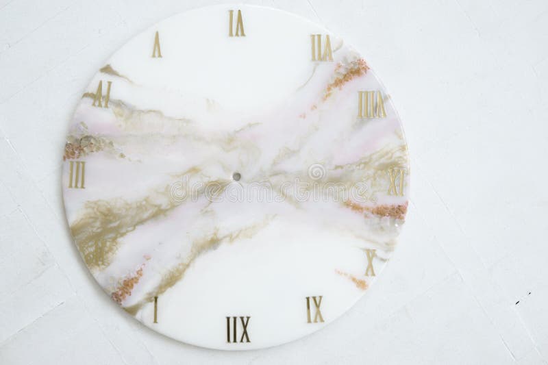 Handmade interior clocks made of epoxy resin. An interior item. Handmade interior clocks made of epoxy resin. An interior item